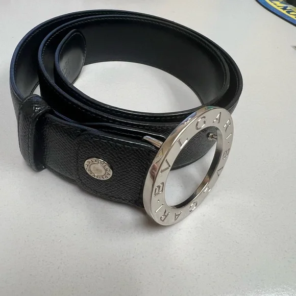 Belt, calf leather, iconic closure, brass palladium plated hrdware. Size 32-34.